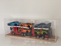 A Lego model in an acrylic display case.