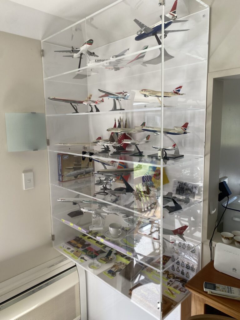 An acrylic wall mounted display cabinet fro collectables
